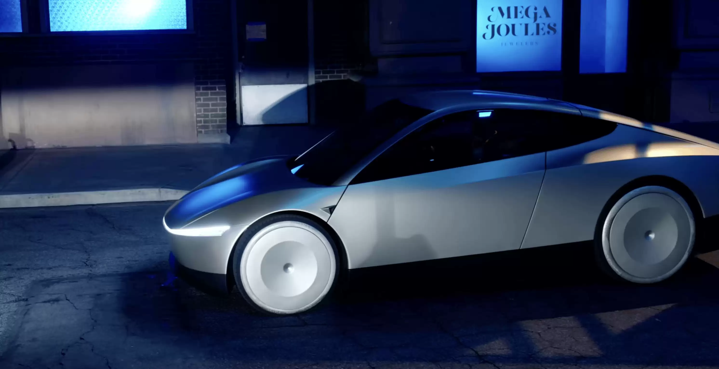 Электрическое такси Tesla CyberCab с автономным управлением и футуристическим дизайном